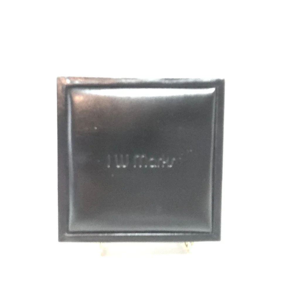 I.W. Marks marks black